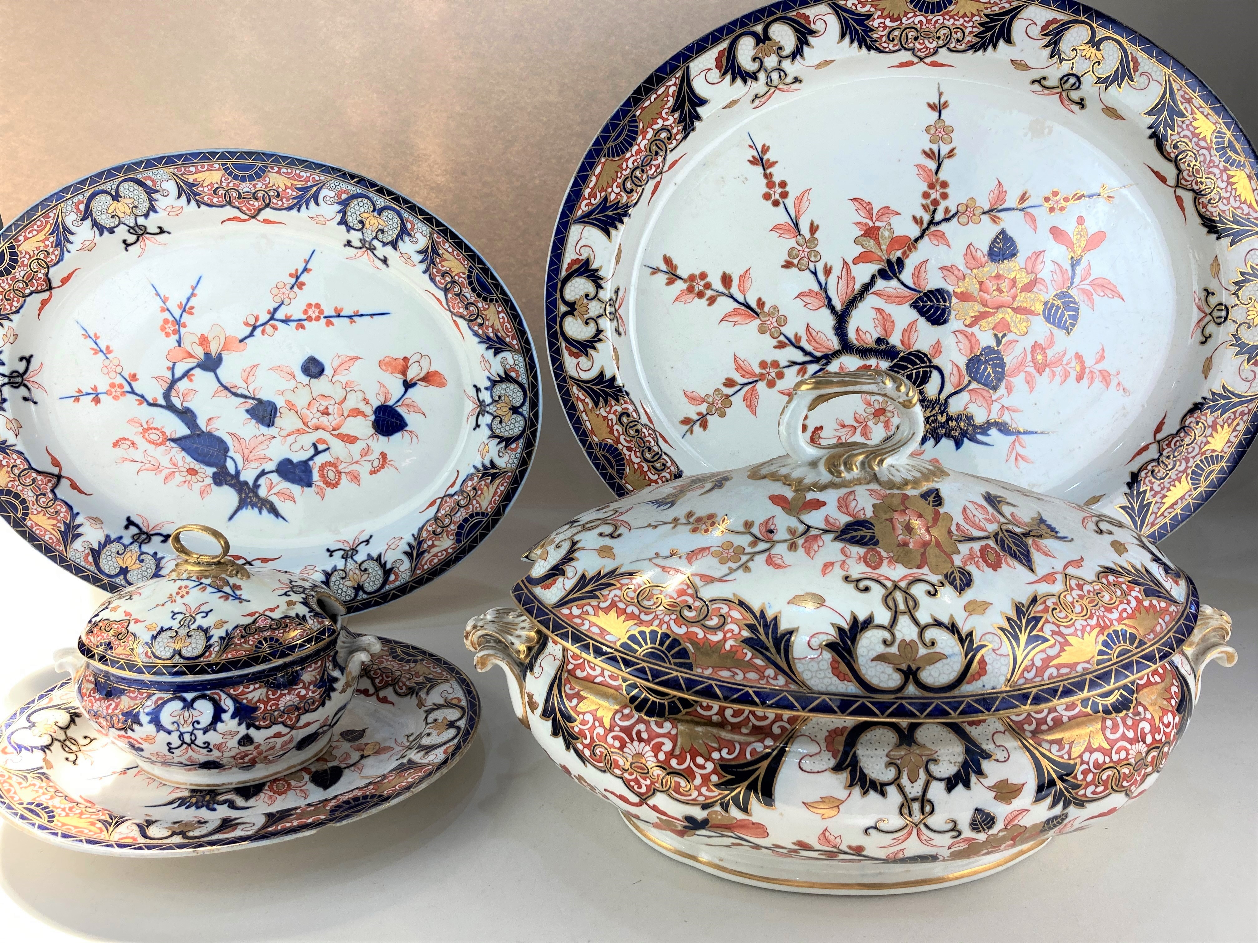 An extensive 18th century and later Derby porcelain part dinner service, decorated in the Imari