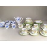 An Art Deco Wellington China coffee set, decorated with forget-me-nots, comprising coffee pot,