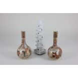 A pair of Japanese Satsuma ware bottle vases, 15.5cm high, together with a white glazed ceramic