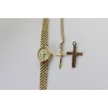 A 9ct gold cross pendant, and another, together with a ladies Sovereign bracelet watch