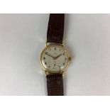 A gentleman's 18ct gold Ebel wristwatch hallmarked for London 1947