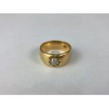 A gentleman's diamond ring the oval old cut stone gypsy set in 18ct gold
