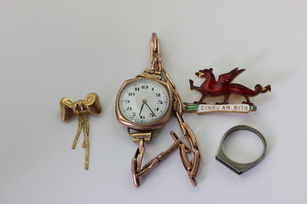 A 9ct gold bracelet watch with replaced movement, and three other items