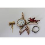 A 9ct gold bracelet watch with replaced movement, and three other items