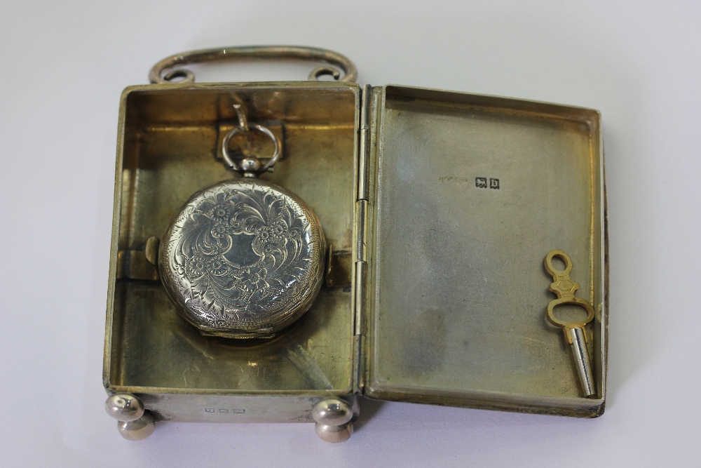 A lady's Swiss silver open face pocket watch circa 1900 in a silver travelling case, hallmarked - Image 2 of 3