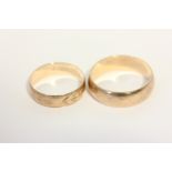 A 9ct gold wedding band, and another with leaf engraving 6.4g