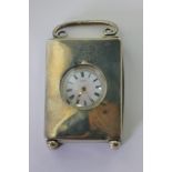 A lady's Swiss silver open face pocket watch circa 1900 in a silver travelling case, hallmarked