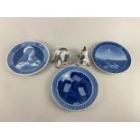 Three Royal Copenhagen blue and white porcelain Christmas plates, dated Jul 1918, 1920 and 1922, and