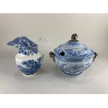 A blue and white ceramic two-handled soup tureen and cover with floral decoration, gilt and navy bud