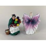 Two Royal Doulton porcelain figures, Isadora (HN2938) and The Old Balloon Seller (HN1315), tallest