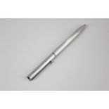 A Mont Blanc stainless steel slim line two colour ballpoint pen