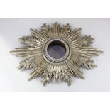 A giltwood sunburst wall frame, for a mirror or clock, 56.5cm, aperture 10.5cm (a/f)