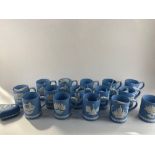 Fifteen Wedgwood jasperware Christmas mugs, 1971-1985, some with original leaflets, together with
