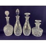 A Stuart crystal cut glass spirit decanter, together with three other cut glass spirit and wine