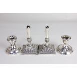 A pair of Edward VII silver dwarf candlesticks, maker James Deakin & Sons, Chester 1909 (a/f),