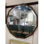 A hexagonal wall mirror, with bevelled mirror plate, 64cm