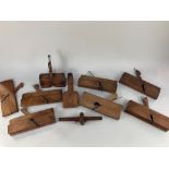 A collection of eight cabinet makers woodworking planes, one by John Moseley & Son, London and one