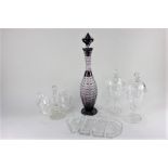 A tall amethyst and clear glass decanter, with metal mounted stopper, after a design by Steven and