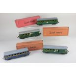 A collection of four French Hornby O gauge model railway coaches, comprising two baggage cars, a