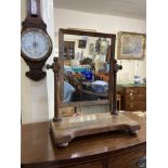 A Victorian mahogany toilet mirror rectangular frame on turned supports 53cm