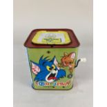 A Rosebud Mattel Tom and Jerry music box, with Jack-in-the-box Tom puppet, 14cm high