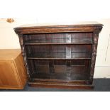 A Victorian carved oak open bookcase, with moulded rectangular top, and four adjustable shelves,