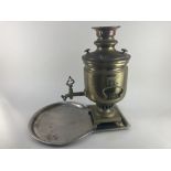 A Russian brass samovar, with Cyrillic makers stamp, on silver plated brass key tray (plating