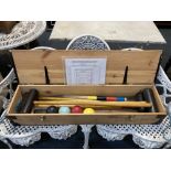 A 20th century croquet set, in metal bound pine carry case, 107.5cm wide