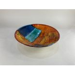A Poole Pottery fruit bowl in the gemstones pattern, 34cm diameter