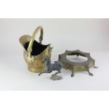 An Eastern brass pot stand, octagonal form, on outswept feet, 23.5cm, a small brass coal scuttle,