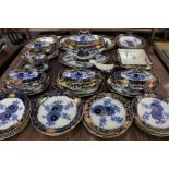 A Royal Doulton 'Persian Spray' porcelain part dinner service, in blue and white with gilt