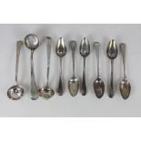 Three Portuguese silver small sauce ladles, one with engraved initial and a set of six coffee spoons