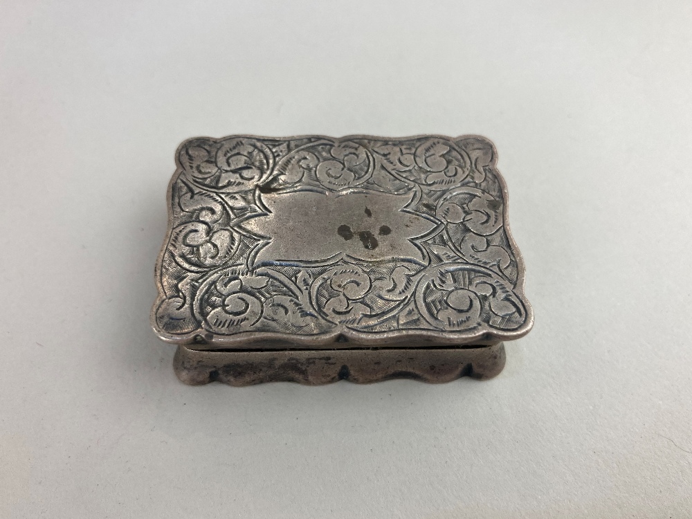 An Edward VII silver snuff box, makers Cornelius Desormeaux Saunders & James Francis Hollings