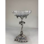 An Elkington & Co style silver plated table centrepiece, the entwined grapevine design supporting