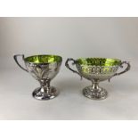 An Art Nouveau silver plated cup, maker WMF with pierced design and green glass liner, 12cm high,