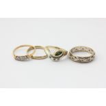 A 14ct gold emerald and diamond ring, a diamond five-stone ring, a 9ct gold wedding ring, and a
