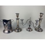 A pair of 19th century silver plated column candlesticks, with embossed floral design, 27cm high (