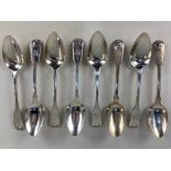 A set of eight George IV silver fiddle and shell pattern teaspoons, maker George Piercy, London