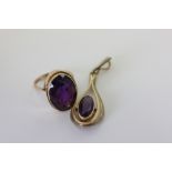 A 9ct gold and amethyst dress ring and an amethyst pendant