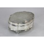 A George V silver jewellery box, maker Deakin & Francis, Birmingham 1912, of scalloped form with