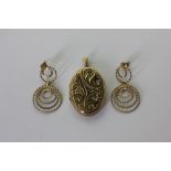 A 9ct gold oval locket, and a pair of 9ct gold drop earrings 9.6g