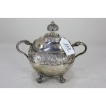 A Portuguese silver sugar basin and cover rounded rectangular form on ball and claw feet with