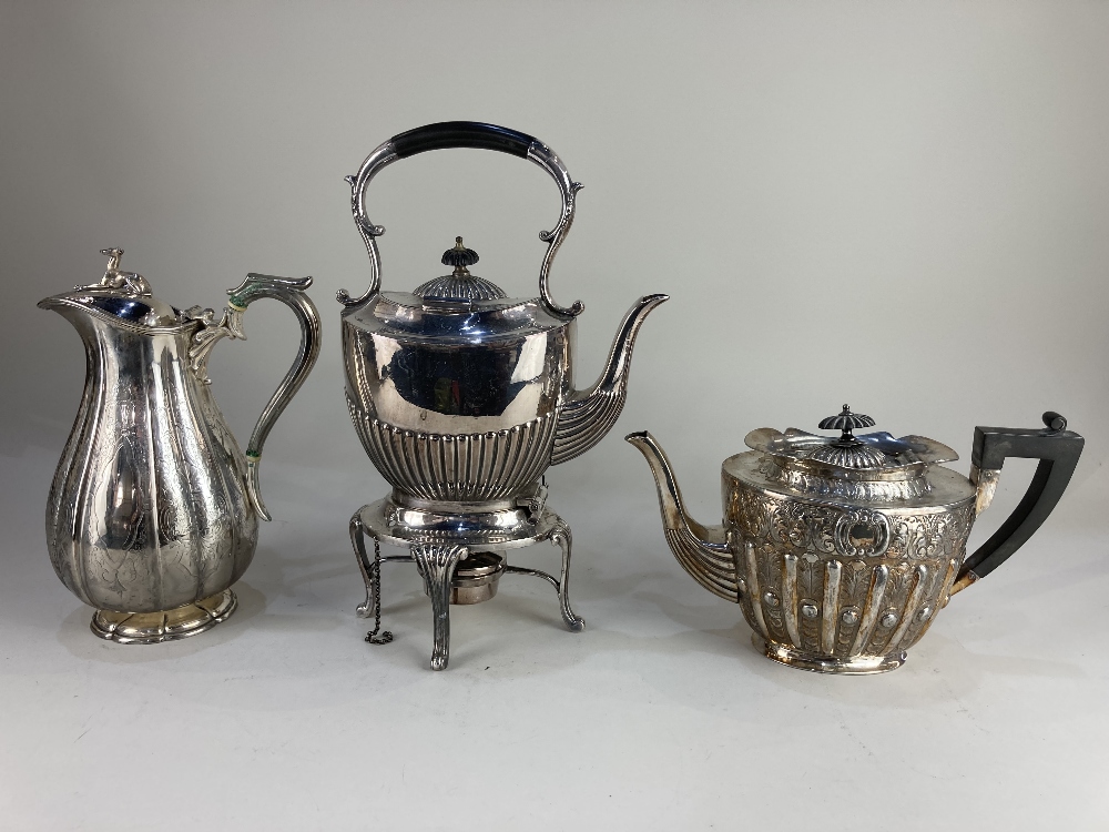 A Victorian silver plated ewer with greyhound finial, a silver plated kettle on stand with burner, a