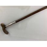 An Edward VII silver mounted horn handled walking stick, the silver hallmarked Julius Klinkhardt,