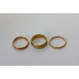 Two 22ct gold wedding rings 6.2g, and an 18ct gold wedding ring 5.4g