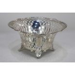 A German 800 silver bonbon dish, maker Gerbruder Kuhn, stamped Friedlaender, with pierced design,