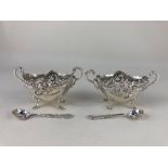 A matched pair of Victorian and later oval silver salts, one by Henry Matthews, Birmingham 1897, the