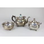 A Portuguese silver teapot with sugar basin and cover, and waste bowl, the bellied bodies with