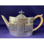 A Victorian silver teapot, maker William Hutton & Sons, Sheffield 1881, of oval form, with