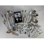 A silver plated soup ladle, together with a collection of silver plated items including grape